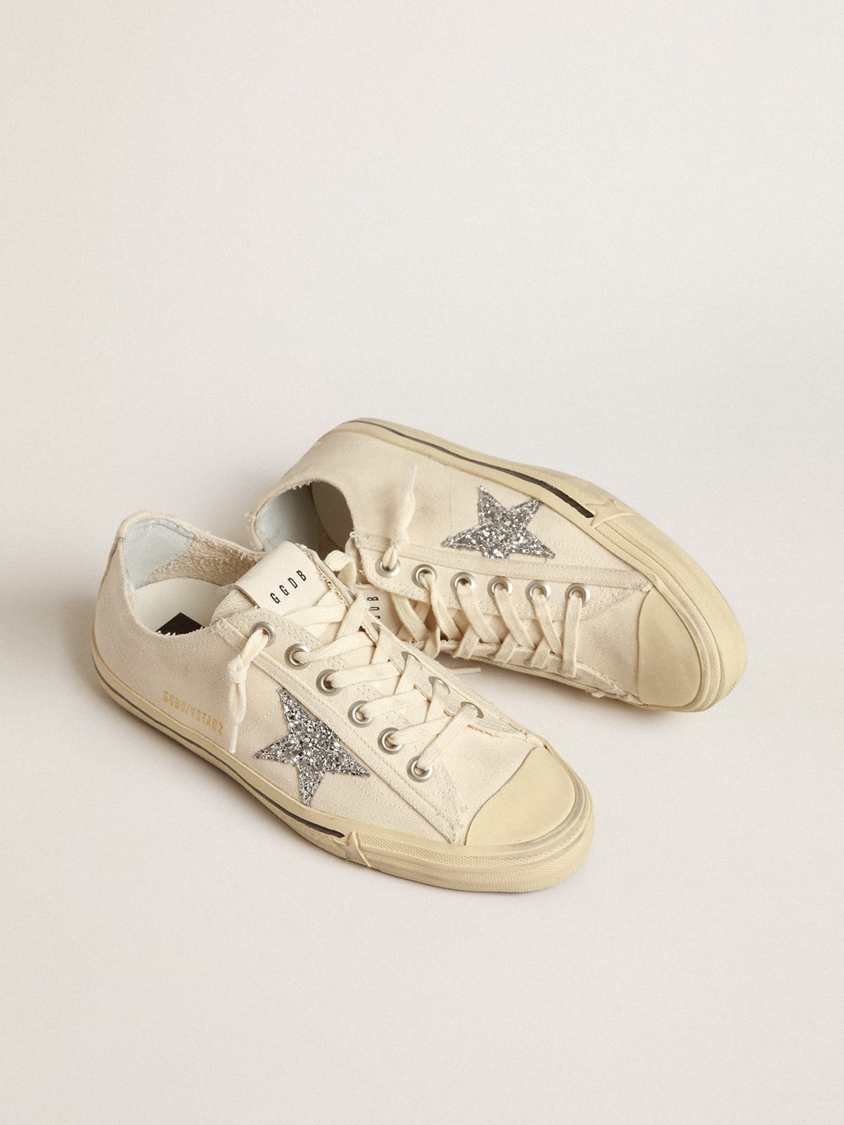 V-Star en toile beige avec étoile à paillettes argentées